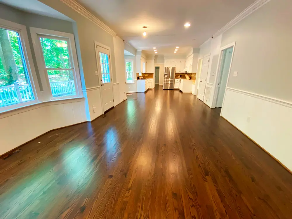 Hardwood floor refinishing project in Raleigh NC living room