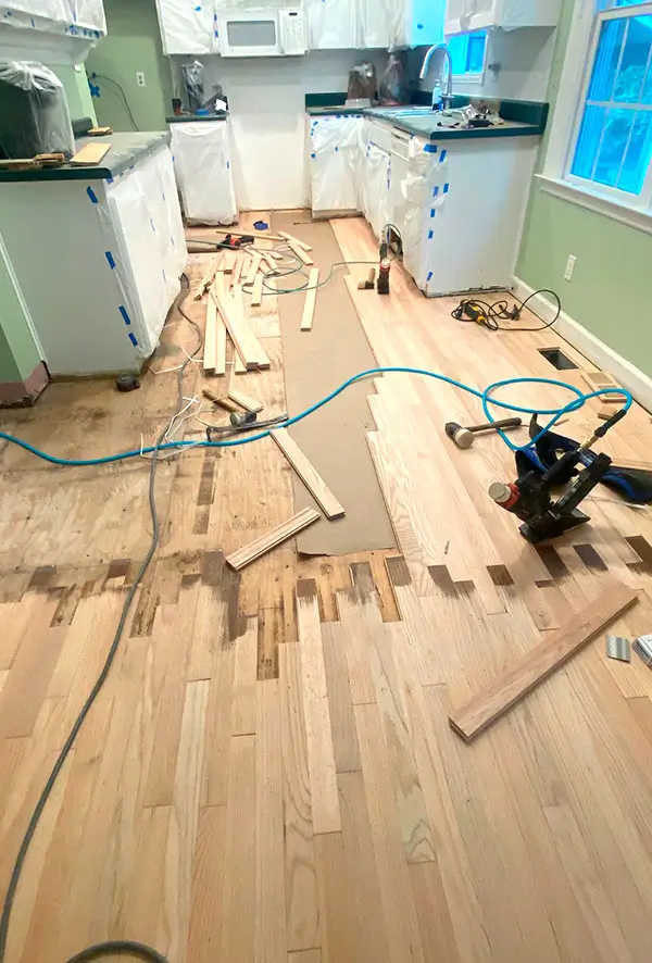 Replacing damaged hardwood flooring planks