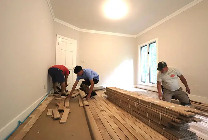 Hardwood flooring installation in progress Raleigh NC