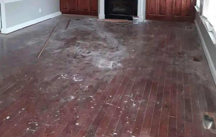 Worn hardwood floors before refinishing Morrisville NC