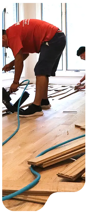 Hardwood Rescue NC technician installing hardwood planks