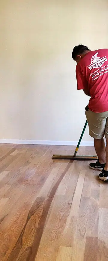 Hardwood Rescue NC team refinishing floors in Morrisville