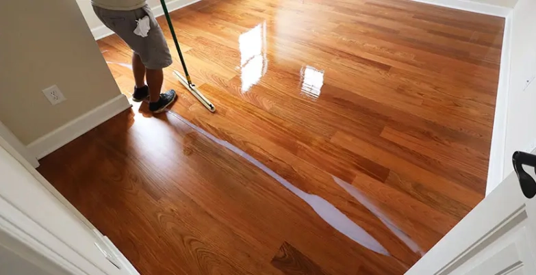 Buff and Coat hardwood floor process in Raleigh NC home